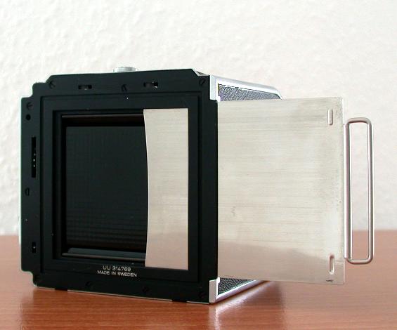 Soyuz TM-8 Hasselblad
          magazine with dark slide partly removed