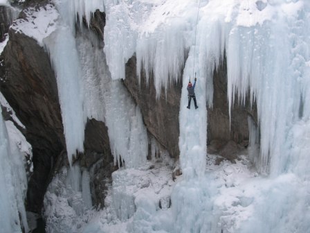 Larry climbs a waterfall at Ouray