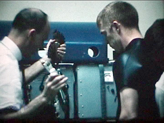 Mattingly shows
          snap hook to Schweikart